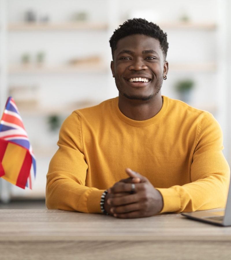 happy-black-man-teacher-working-at-language-school-2026-01-08-23-07-57-utc (1) (1)